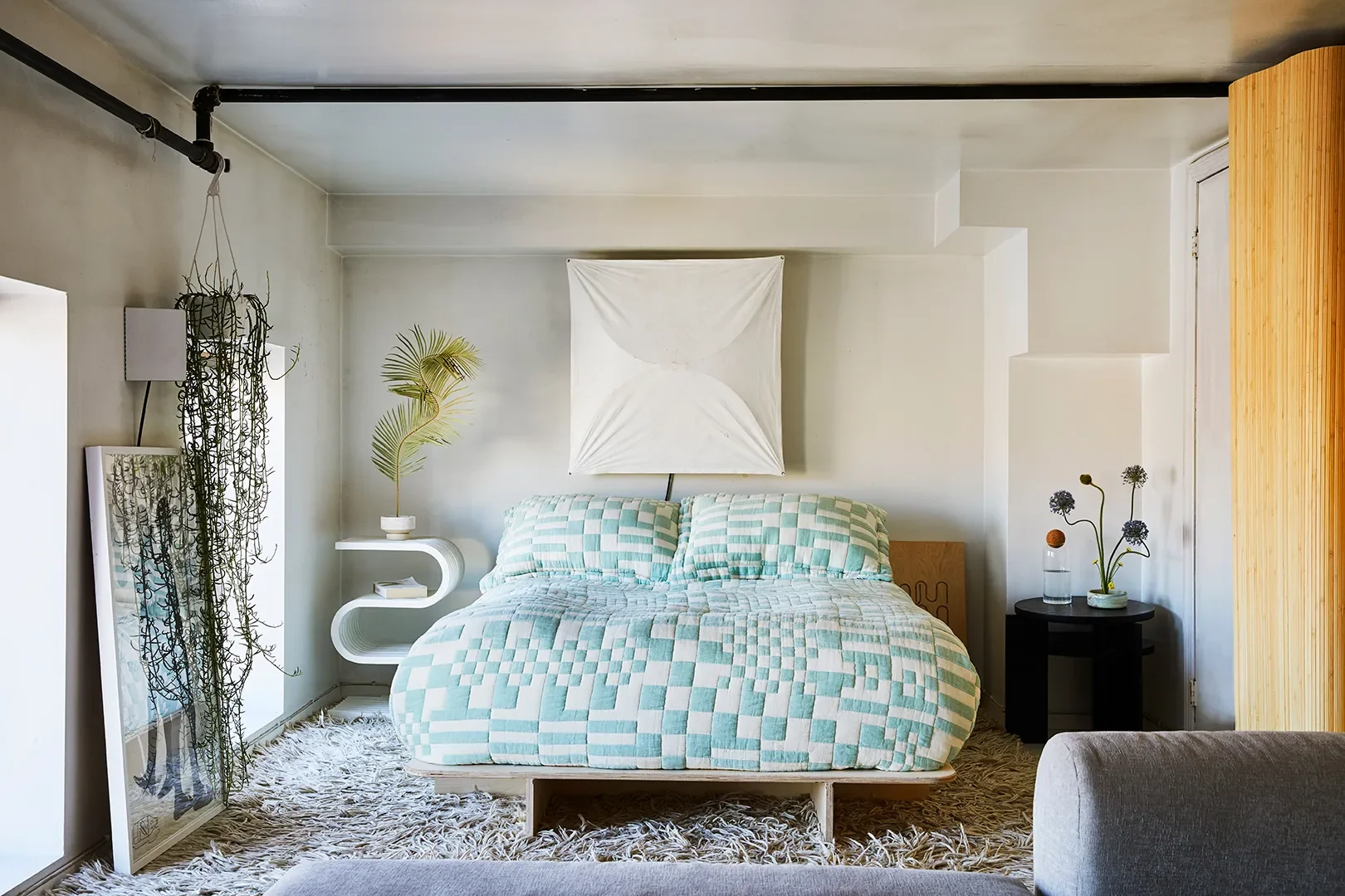 Light Fixture,Flos; Bedding,Dusen Dusen; Side Table, Christine Espinal.