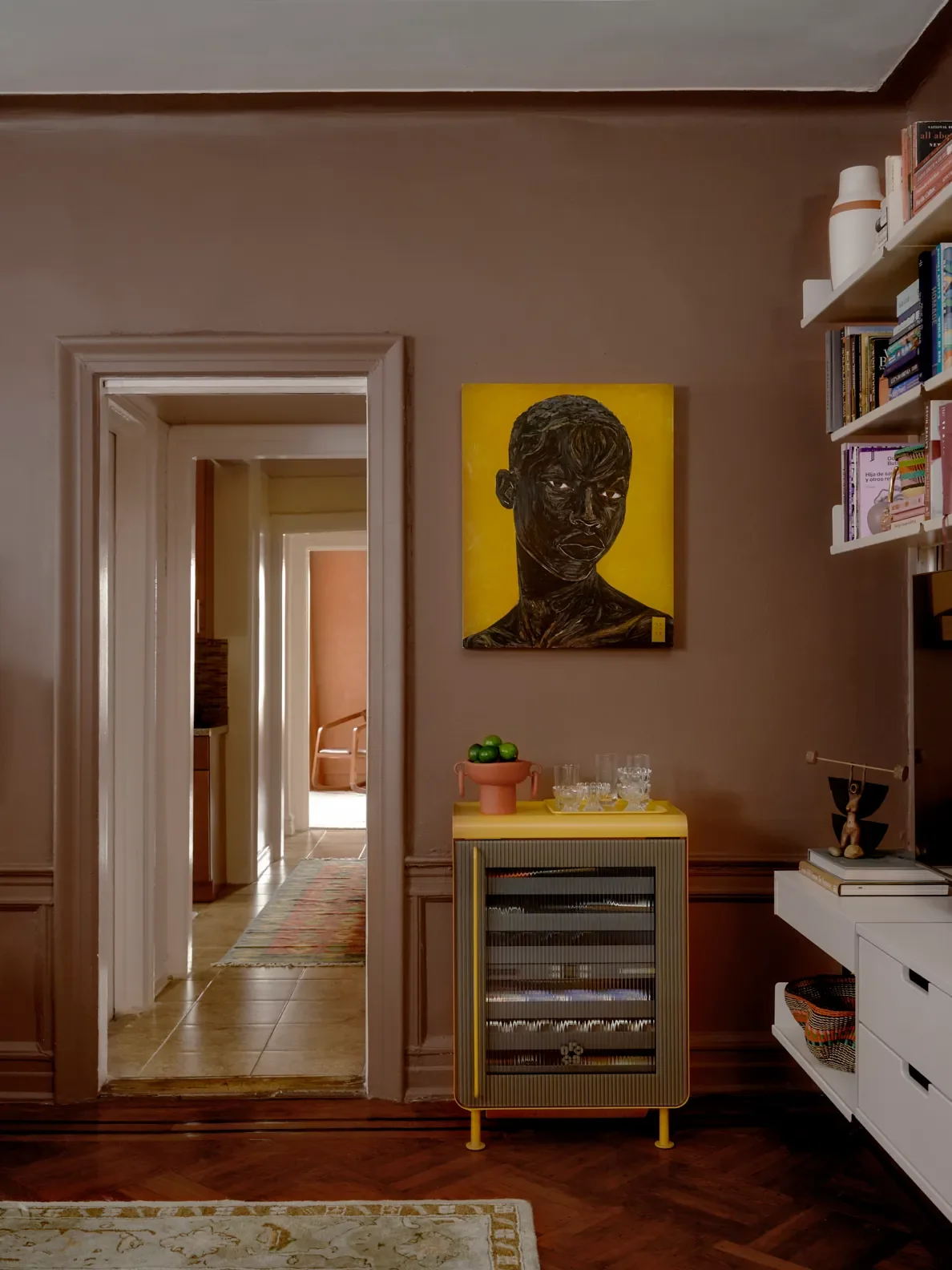 The Rocco Super Smart Fridge complemented artwork that I already owned—“Above All Else I Want to See” by Amy Amalia—and I really wanted that piece to be a statement. I love that the Vitsoe shelving ca