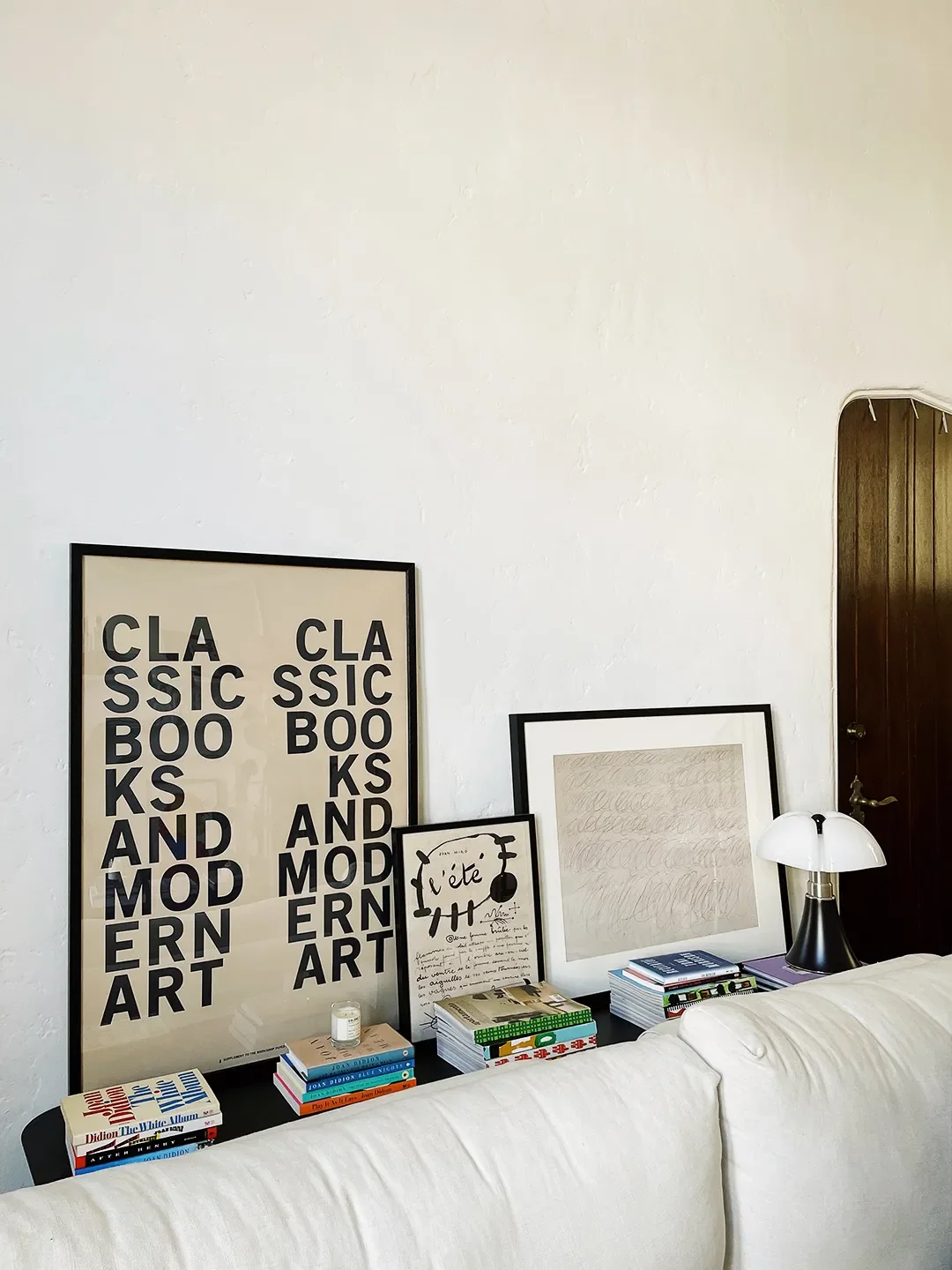 Poster,Book/Shop; Vintage Lamp and Console Table.