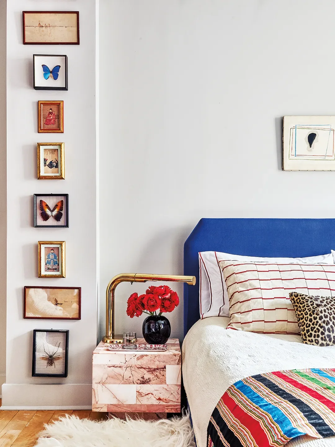 bed with blue headboard